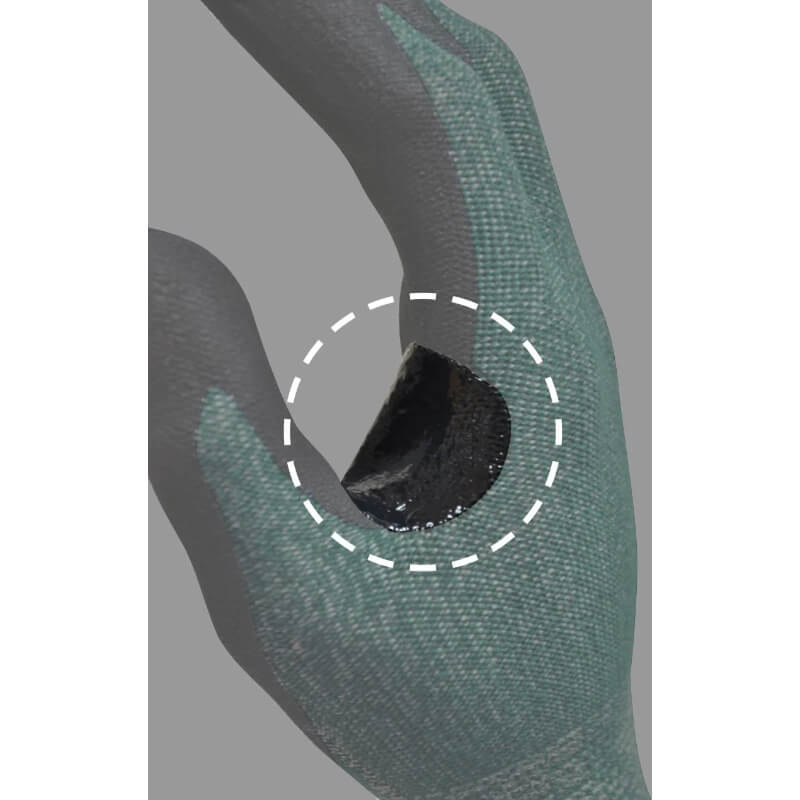 Close-up of a green gardening glove with a focus on the wrist area.